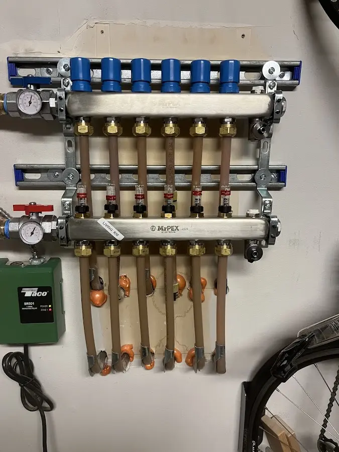 Plumber performing Water Heater Repair at a residential property in Warrenton